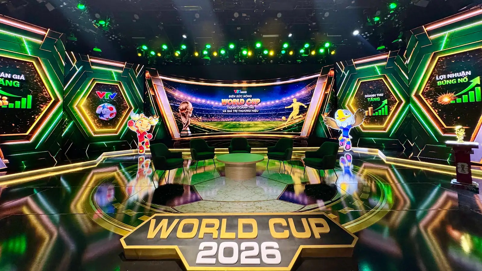 Bối cảnh Kinh Doanh Mùa World Cup với ghế xanh, bàn tròn và các mảng hình học viền sáng